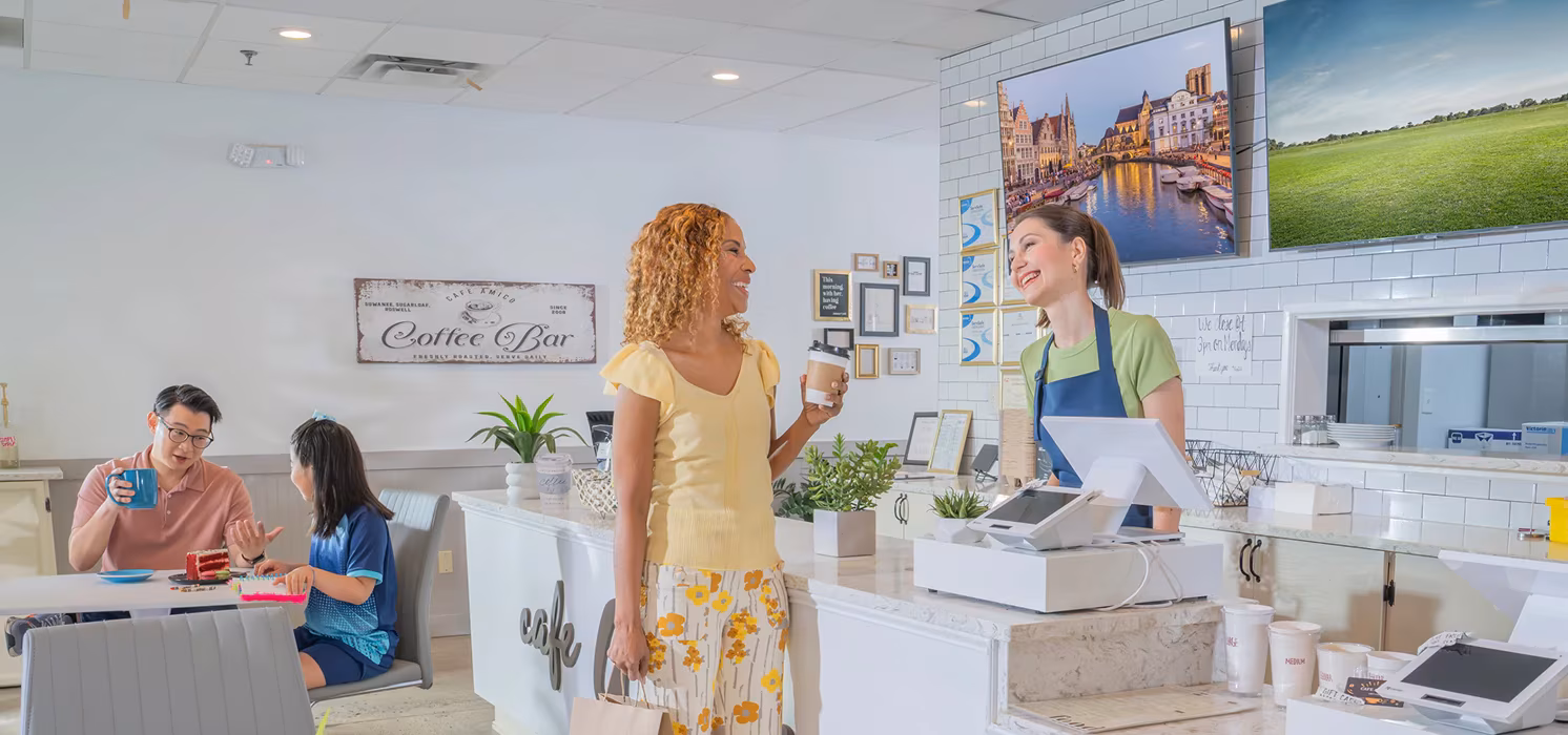 3up woman at counter dsk
